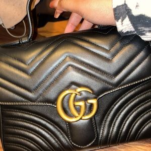 Gucci marmot top handle bag